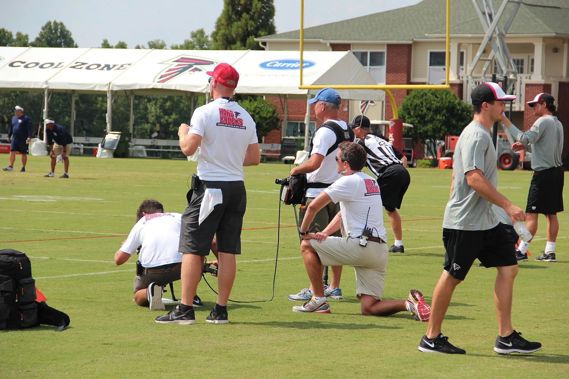 Hard Knocks film crew at Falcons training camp. Atlanta shoot and edit work: what Georgia's film tax credit requires