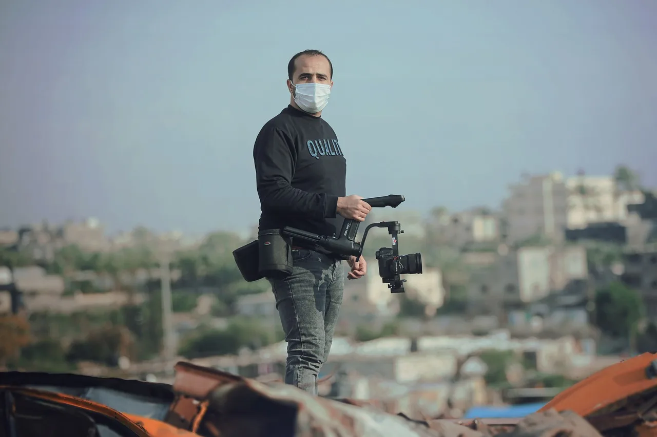 man, mask, journalist, camera, camera man, videographer, videography, face mask, new normal, coronavirus, pandemic, press, videographer, videographer, videographer, videography, videography, videography, videography, videography. How California sales tax treats videography and postproduction services