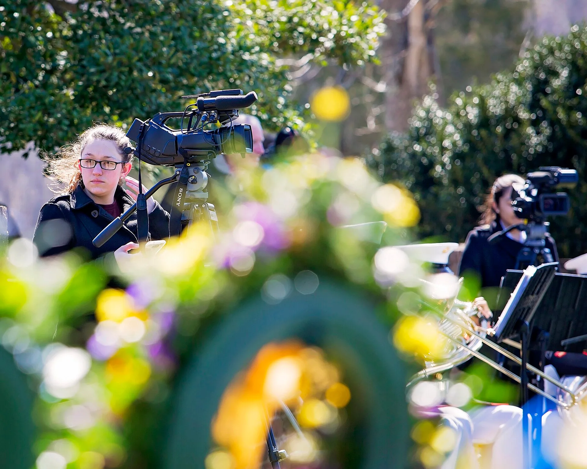 U.S. Marine Corps Cpl. Bria M. Milcherska , videographer, Marine Corps Base Quantico Combat Camera , sets up her equipment during the Madison wreath laying ceremony, held at the final resting place of the 4th President of the United States, James Madison, also known as the Father of the Constitution. Videography hiring: a reliability scorecard for interviews