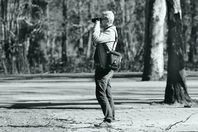 photographer, photography, man, camera, gear, standing, shooting, focus, shot, shutter, digital, people, person, gray camera, gray digital, gray photography, gray focus. The real cost of insuring a videography business, explained